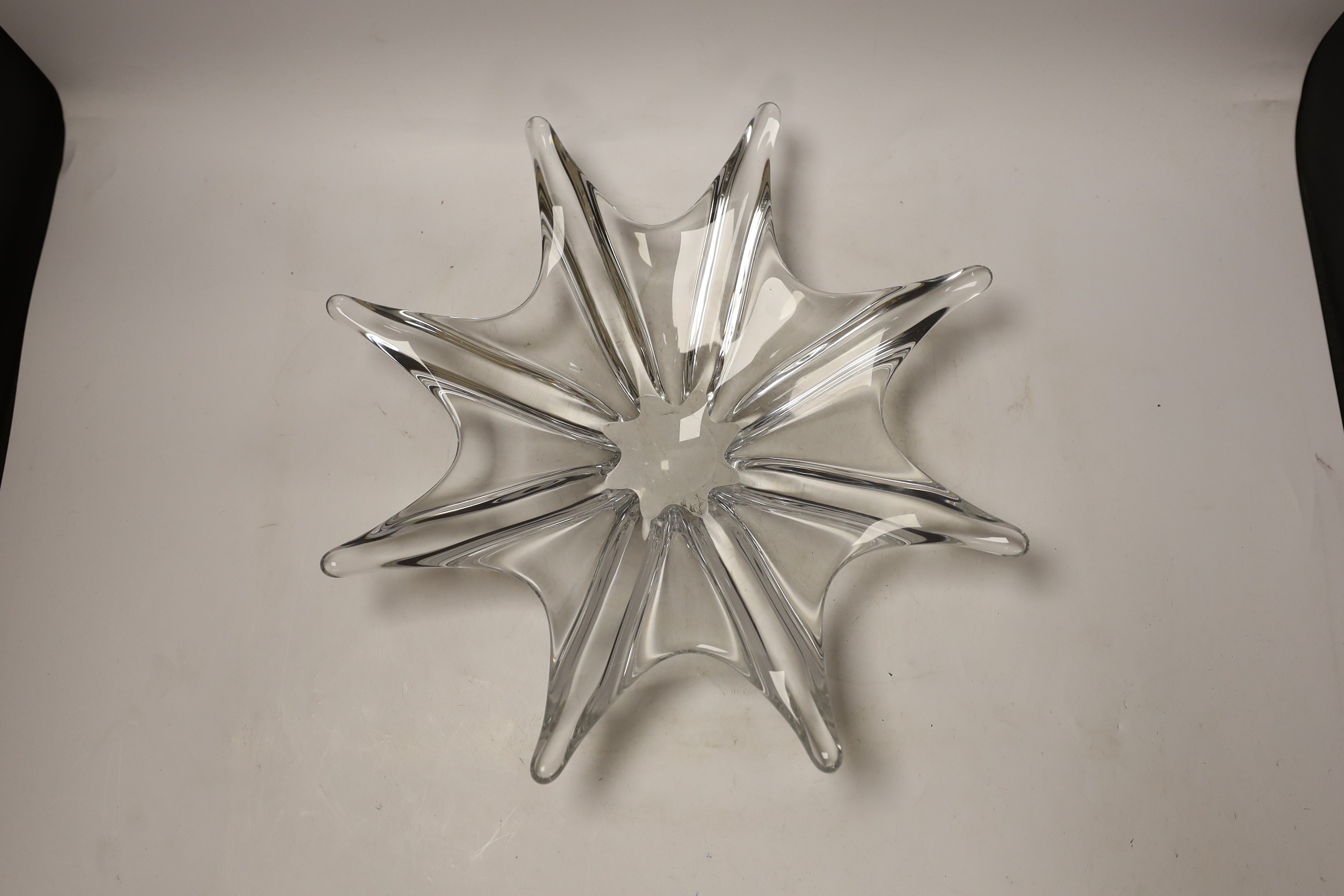 A Baccarat stamped glass star-shaped dish, 38cm diameter